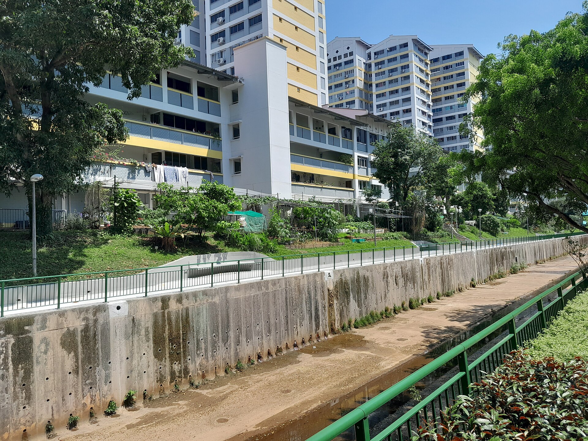HDB upgrader couple reviewing a District 19 private condo affordability and ABSD checklist