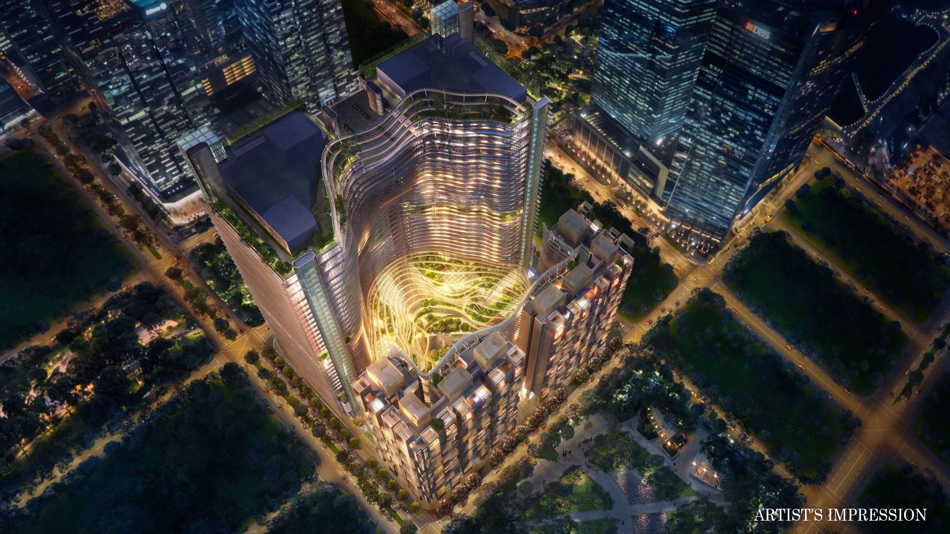 Marina One Residences aerial view of the development lit at night